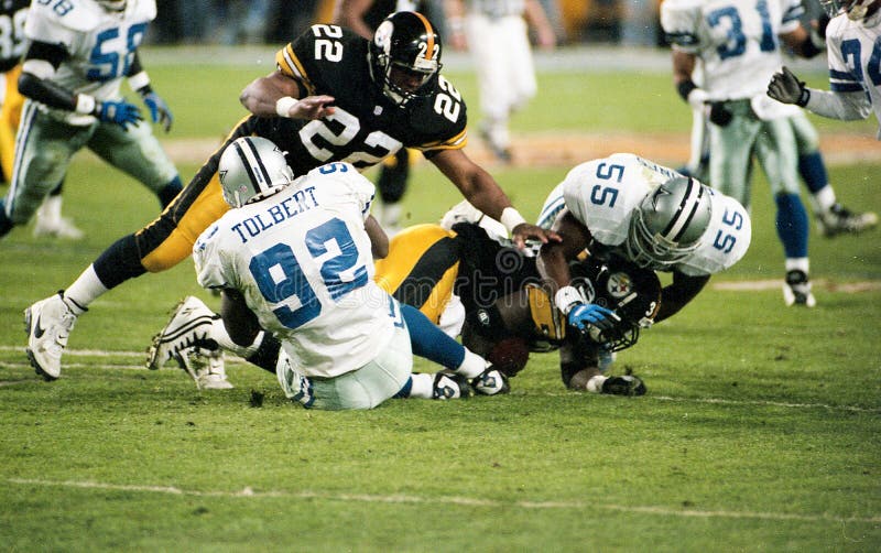 Dallas Cowboys DL Tony Tolbert tackles Steelers Bam Morris. Image taken from color negative. Dallas Cowboys DL Tony Tolbert tackles Steelers Bam Morris. Image taken from color negative.