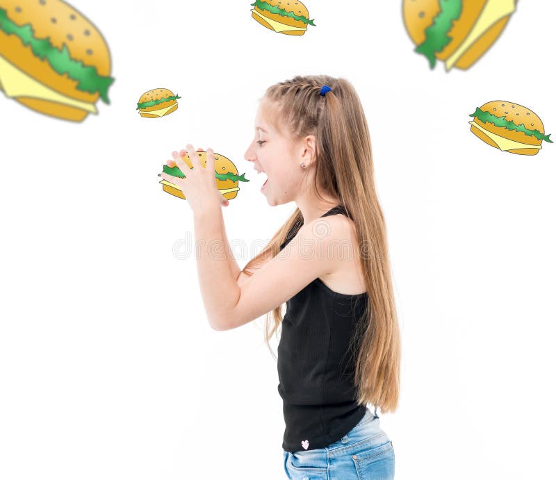 Tonårig flicka som äter hamburgare, hamburgare runt om henne royaltyfri foto Tonårig flicka som äter hamburgare, hamburgare runt om henne royaltyfri foto