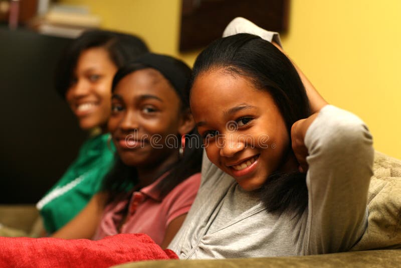 Three African American teenage sisters. Three African American teenage sisters