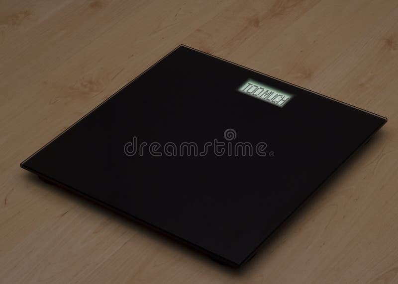 Looking Down At The Scales Far Too Overweight Stock Photo, Picture and  Royalty Free Image. Image 30209379.