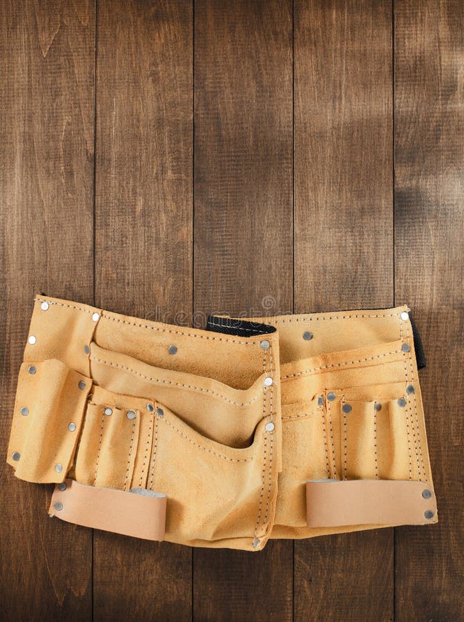Tool belt on wood stock photo. Image of black, chamois 66073756