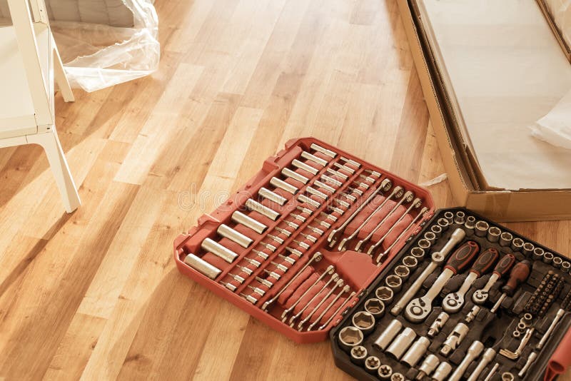 Tool Box,set of Bits and Wrenches on Laminated Floor. Stock Image