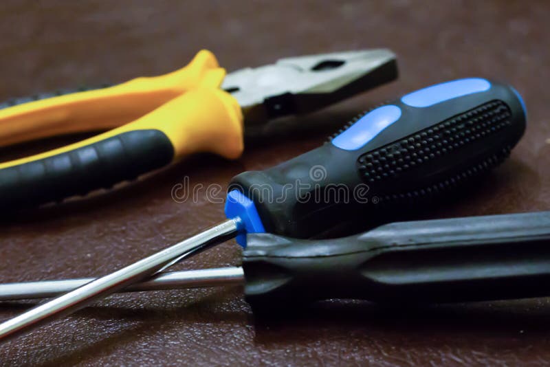 Tool set pliers yellow long screwdrivers fixation home tools electrical repair