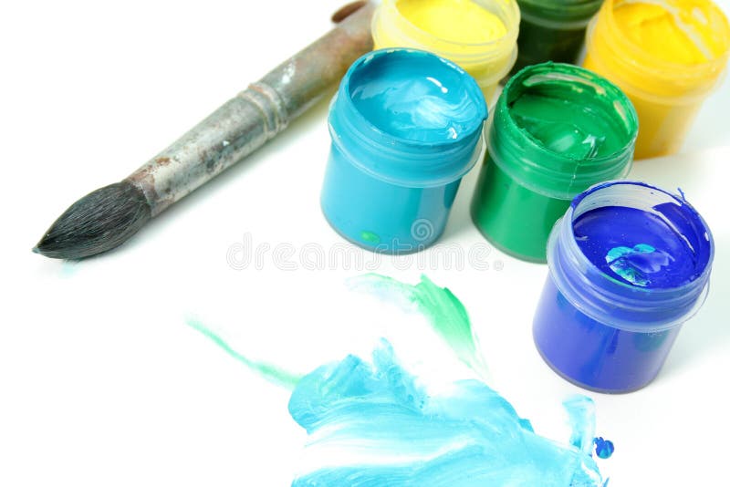 Tools of the artist: paints, brush and a paper