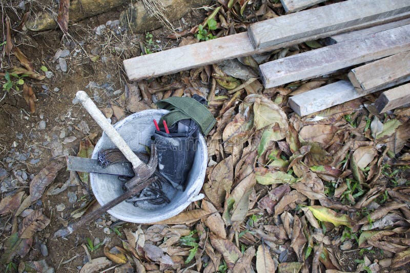 Tools, Cement, Cleaning Tanks, Gyan Plaster, Concrete Gray. Stock Image