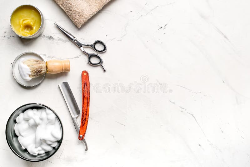 Tools for cutting beard in barbershop on workplace background top view mockup