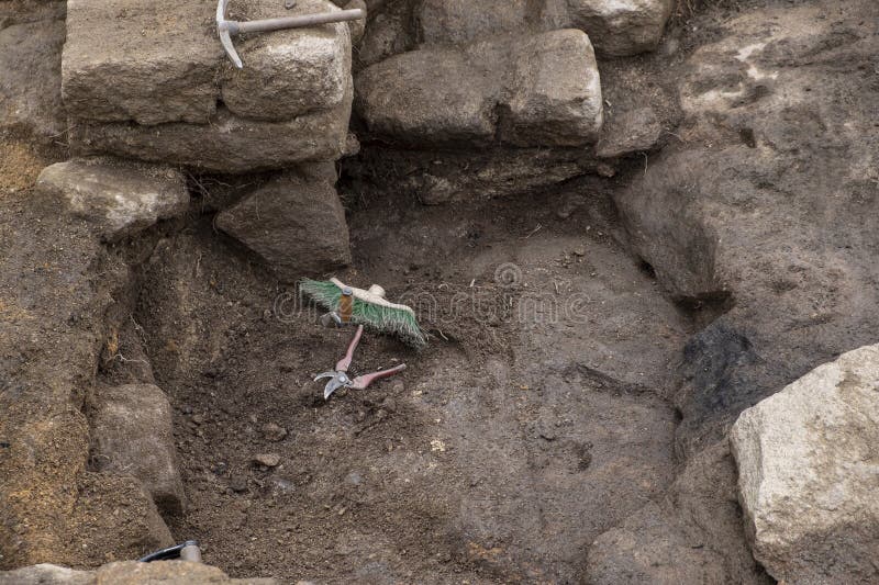 Tools on the Ground in an Archaeological Excavation Stock Image Image