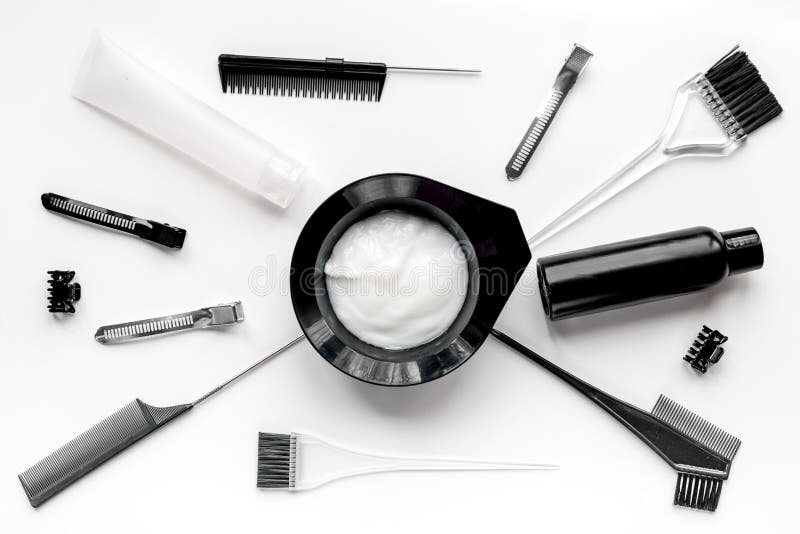 Tools for hair dye in barbershop on white background top view