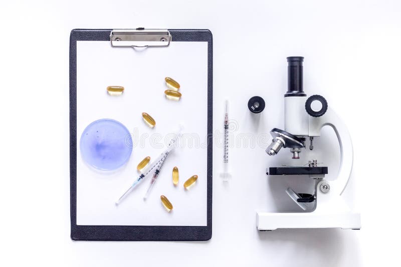Tools for Medical Tests Microscope, Petri Dish, Syringe on White