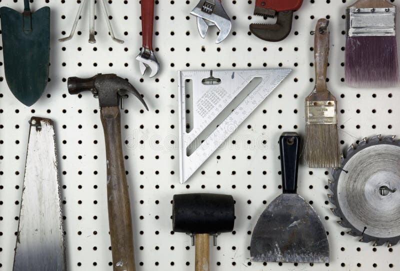 Tools organized on a pegboard in a garage