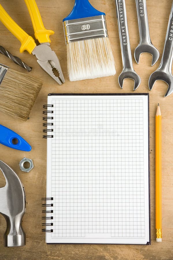 Tools and pad on wood