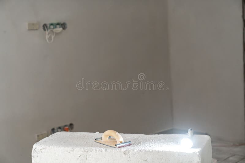 Tools for Sanding Walls and Ceilings on the Construction Site, Trowel