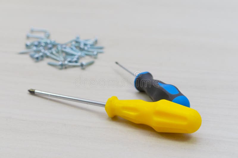 Tools Worker, Screwdriver, Nail, on a White Background Stock Photo
