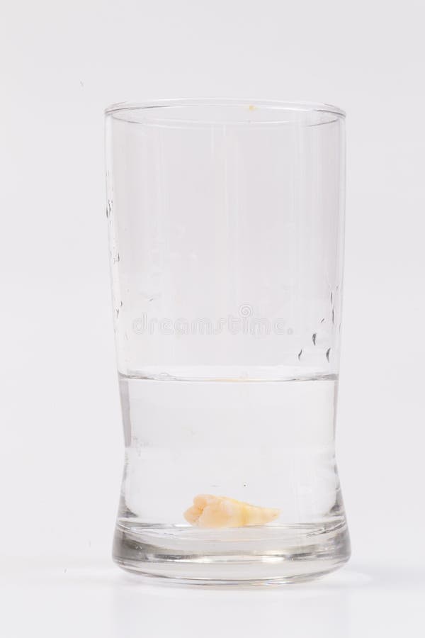 Tooth Decay in a Glass of Water Stock Photo Image of concept, filling