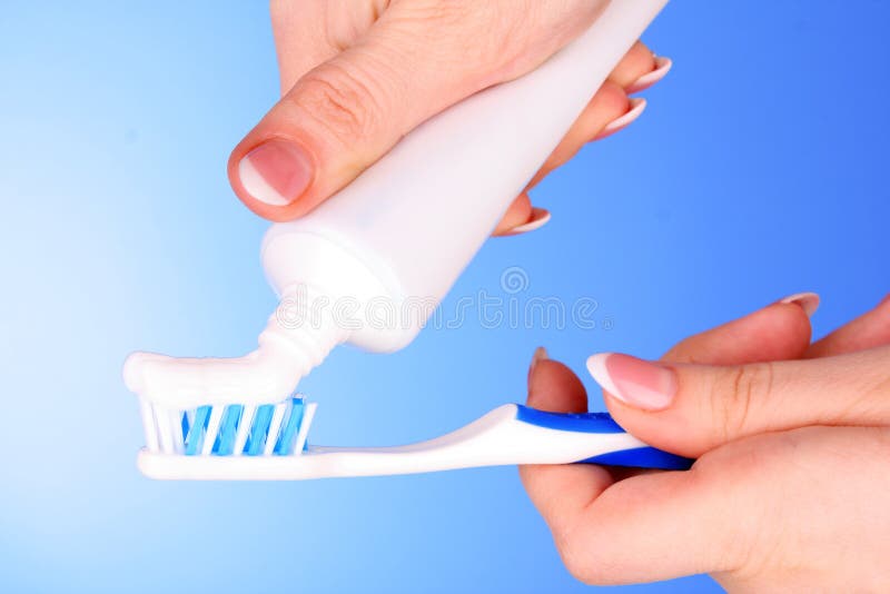 Tooth-paste and brush in hand royalty free stock photos Tooth-paste and brush in hand royalty free stock photos