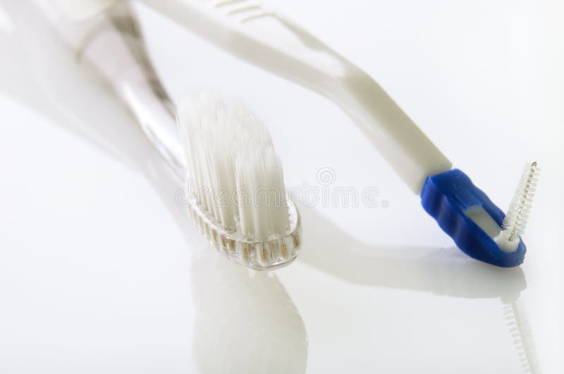 Toothbrush and ruff on white table