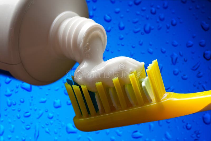 Toothbrush and toothpaste stock photo. Image of plastic 59155404