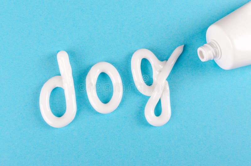 Toothpaste for Dogs, Animal Teeth Care Concept, on Blue Background