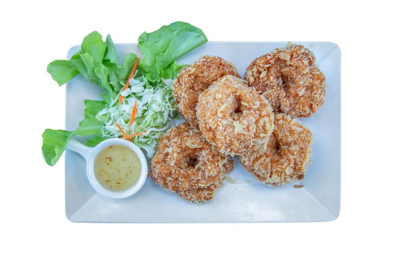 Die cut of Deep fried shrimp cake on white plate, on white isolated. Die cut of Deep fried shrimp cake on white plate, on white isolated