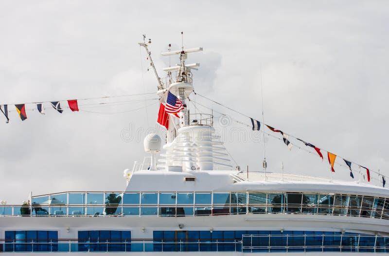 Top of Cruise Ship with Flags royalty free stock image.