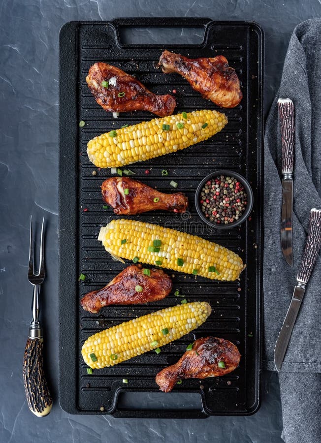 Top Down Vertical View of a Cast Iron Grill Pan of BBQ Chicken