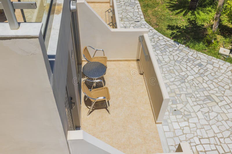 Top Down View on Patio of Hotel Room on Ground Floor. Stock Photo