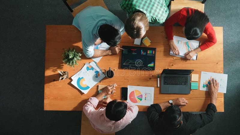 Top down view of smart business woman explain and present chart. Convocation. royalty free stock image
