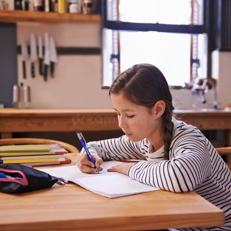 doing homework at the kitchen table