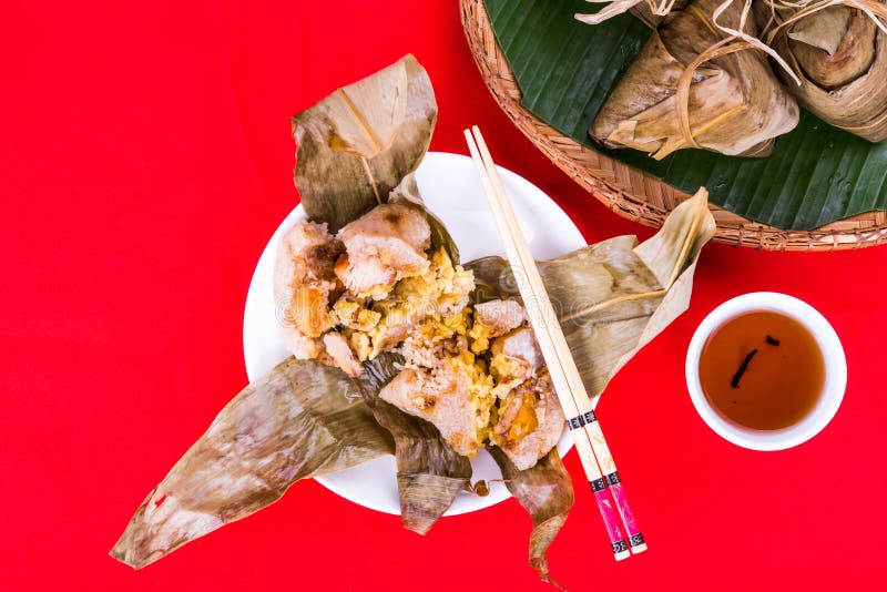 Top lay view of steamed Chinese rice dumpling or zongzi served with oriental tea stock photography Top lay view of steamed Chinese rice dumpling or zongzi served with oriental tea stock photography
