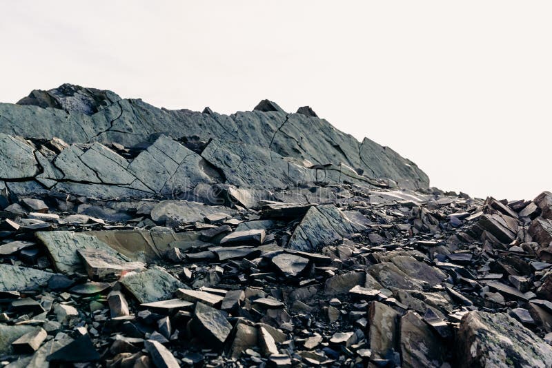 The Top of a Rocky Mountain Range. Gray Flat Stones Stock Photo Image