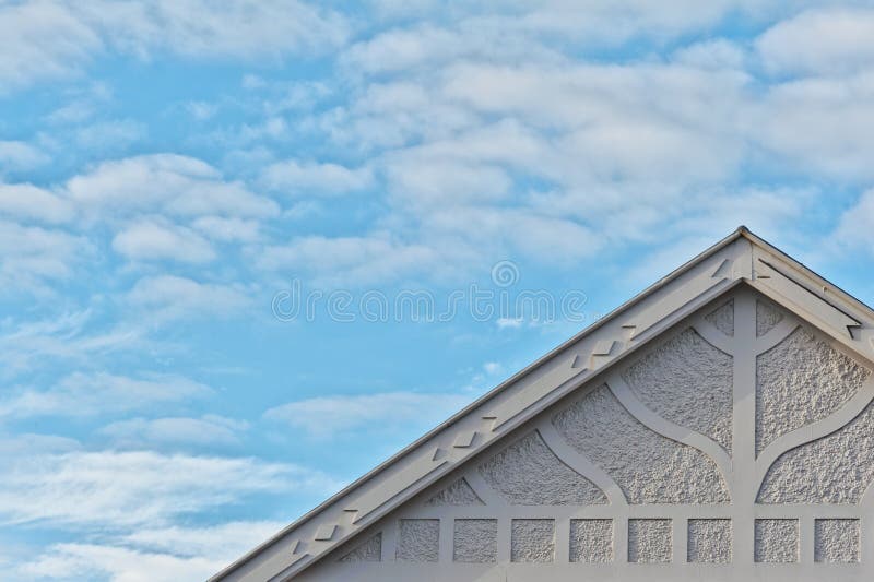Top roof line shapes and patterns of a art deco residential home. The top roof line shapes and patterns of a art deco residential home contrast with the soft stock photos Top roof line shapes and patterns of a art deco residential home. The top roof line shapes and patterns of a art deco residential home contrast with the soft stock photos