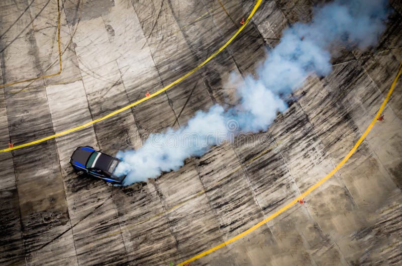 Top view of aerial from drone. Professional driver drift car on