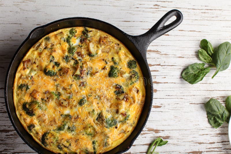 Top view of baked egg frittata with spinach stock photo