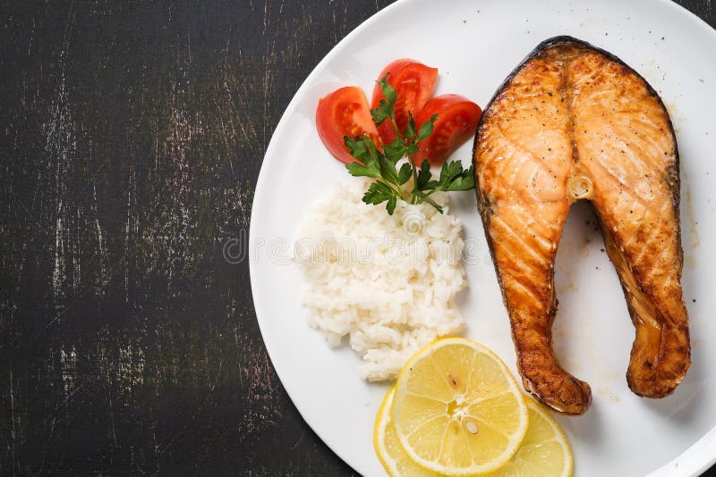 Top View of Baked Trout with Vegetables and Rice Stock Photo Image of
