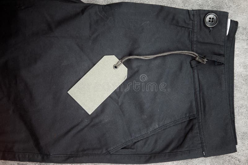 Top View of Black Pants Fashion Folded and Empty Paper Label Stock ...