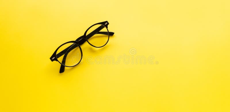Top View. Black Vintage Glasses of Accessory Fashion, Minimal Style on Yellow  Background Use for Wallpaper and Screen Stock Image - Image of background,  object: 158834381