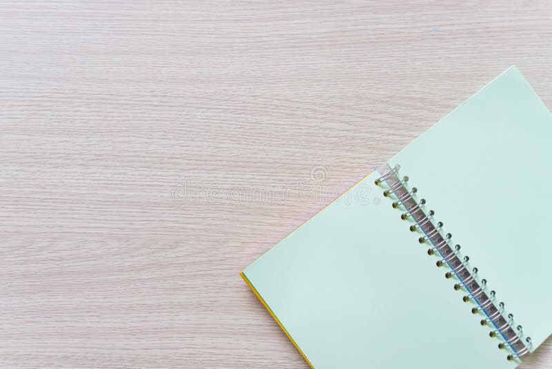 Top view of Blank notebook on wood background with copy space royalty free stock image Top view of Blank notebook on wood background with copy space royalty free stock image