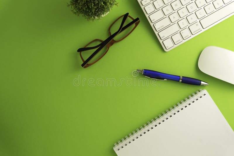 Top View of Blank Paper Page on Green Background Office Desk and ...