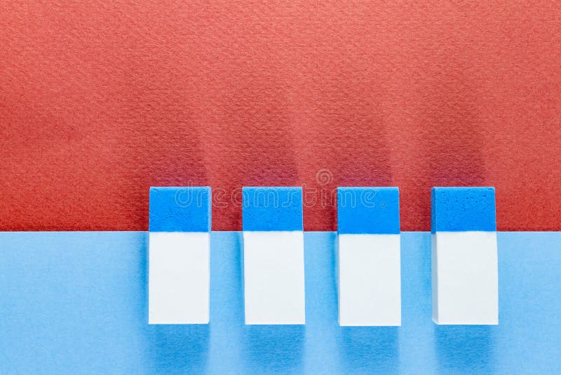 Top view of colorful erasers on color papers in landscape royalty free stock photos