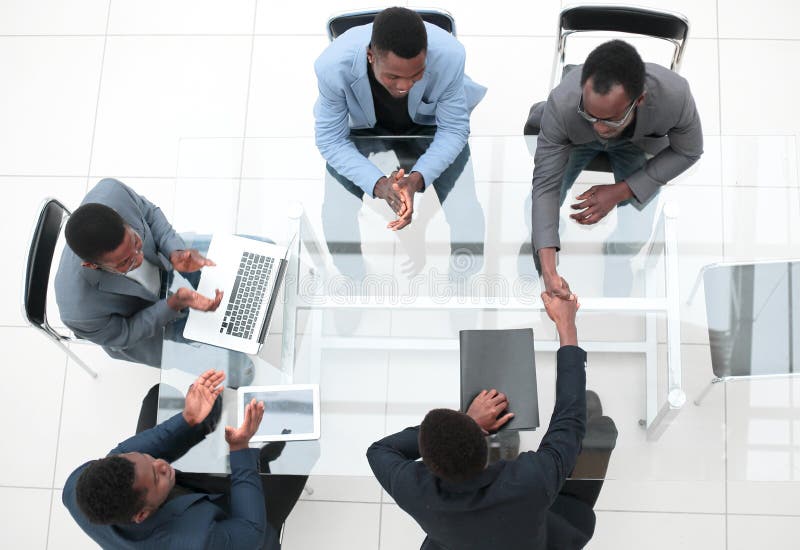 Top view. business handshake at an office meeting. royalty free stock photo