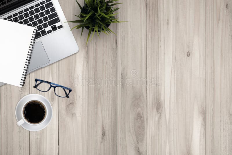 Top view business office supplies. Laptop with notebook and smart phone. royalty free stock image Top view business office supplies. Laptop with notebook and smart phone. royalty free stock image