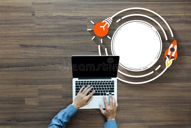 Top view Businessman working laptop on rocket launch with creative light bulb ideas royalty free stock photo