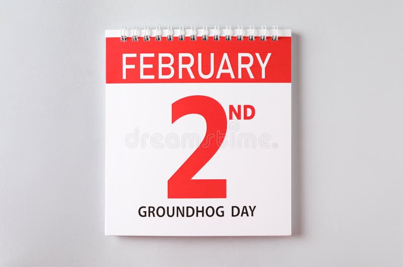 Top view of calendar with date February 2nd on light background. Groundhog day