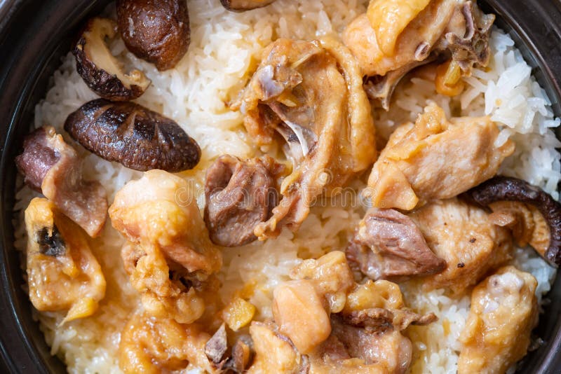 Clay Pot Rice with Chicken and Mushrooms Close Up Stock Photo Image