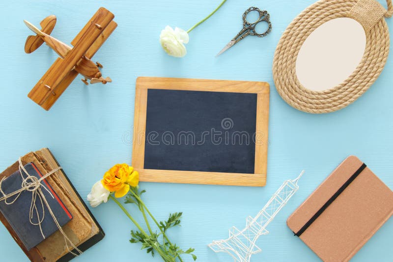 top view of collection of objects over blue wooden table