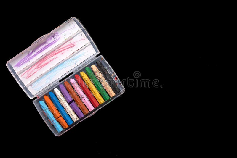 top view colorful of crayons in box after use for drawing, isolated on black background royalty free stock photo top view colorful of crayons in box after use for drawing, isolated on black background royalty free stock photo