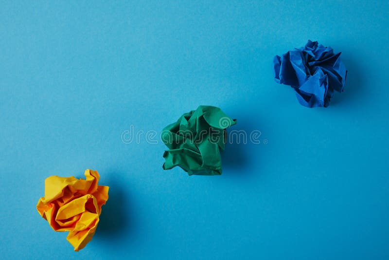 Top view of colorful crumpled papers royalty free stock images