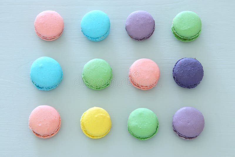 Top View of Colorful Macaron or Macaroon Over Pastel Blue Background ...