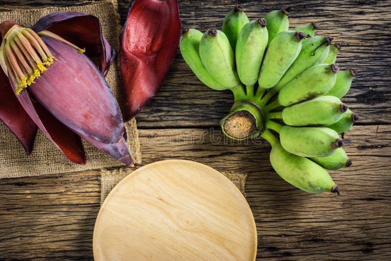 Top view Cultivated banana and banana blossom on the table.