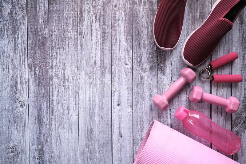 Top View of Dumbbell, Shoe and Exercise Mat on Table Stock Image